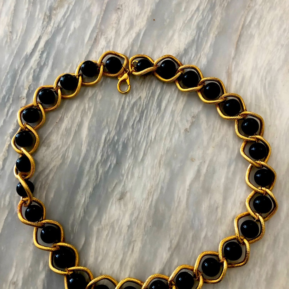 Vintage Lady Remington Necklace. Black Pearl Like Surrounded by Gold Like Braid.